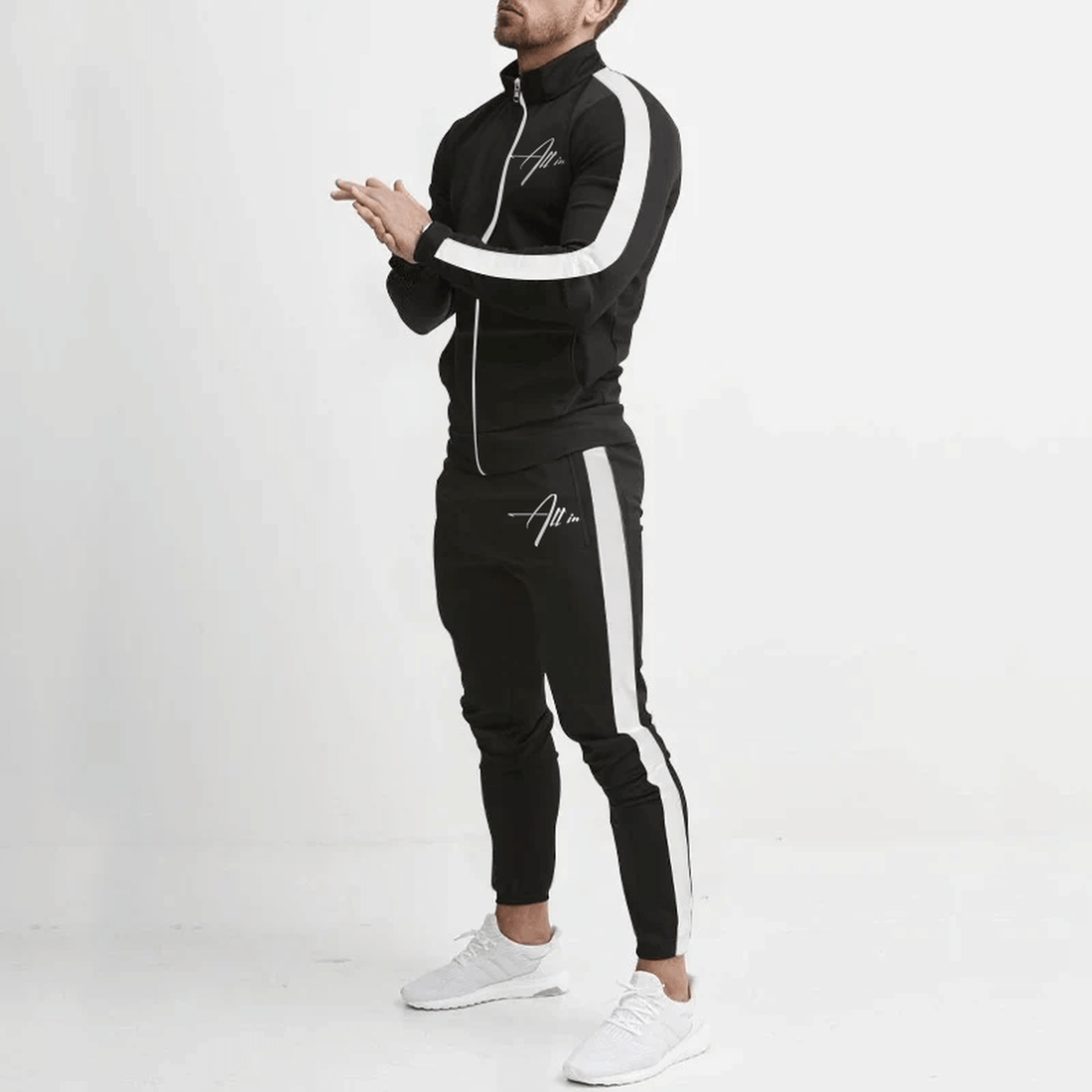 schwarzer Tracksuit aus Polyester mit weißen Streifen veredelt mit einem All in Signature Design. Slim fit, atmungsaktiv und bequem 
