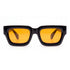 Sonnenbrille Herren mit orangen Gläsern und glänzendem schwarzem Rahmen, Frontansicht